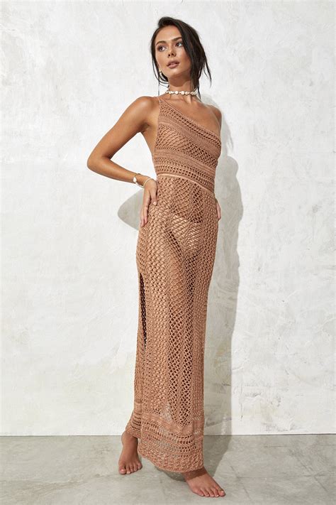 Flook the label - Revive your playful side with our sensuous Alegra Dress, featuring a sheer silhouette with flattering open scoop back. This luxe knit mini-dress encourages your inner flirt. Breathable rayon fabric guarantees comfort while teasing the silhouette of the body.